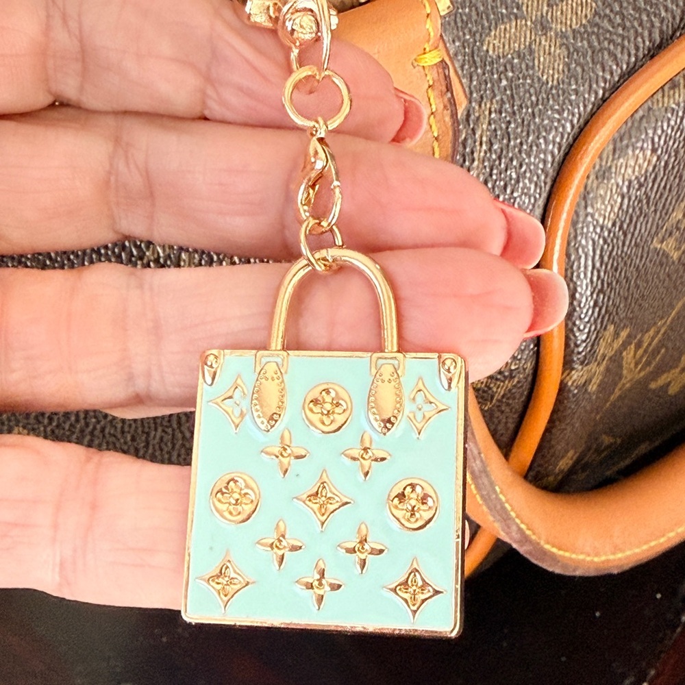 Louis Vuitton EUC Authentic 
stamped Mini Bag Charm/Keychain
Tiffany Blue & Gold
